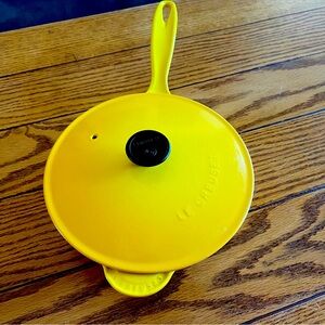 Le Creuset enameled 2.2 qt cast iron sauce pan in Dijon